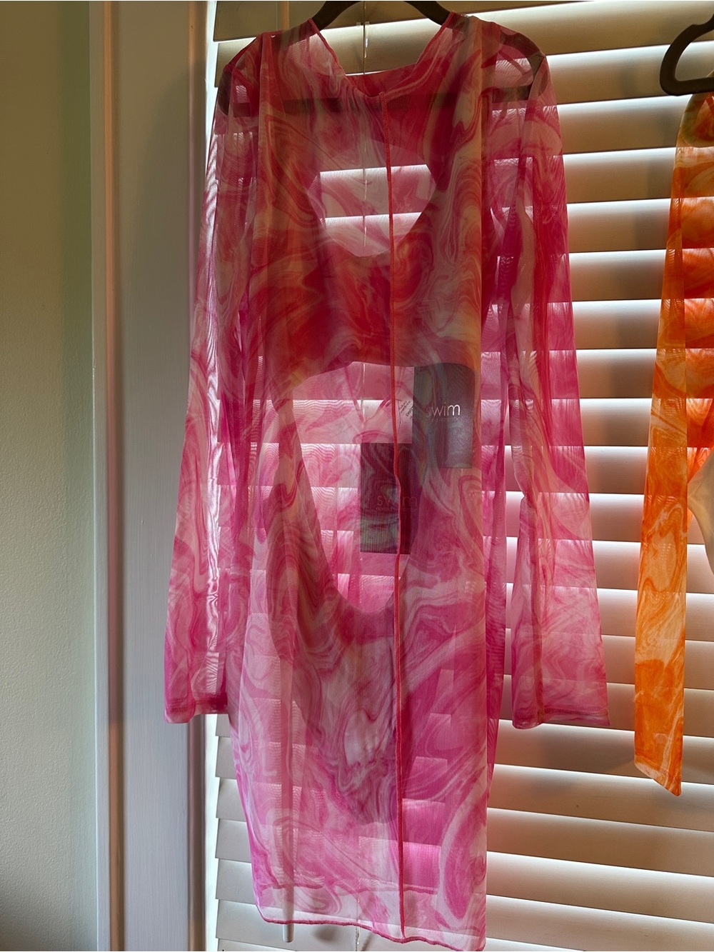 Naked Wardrobe
Sheer Pink Marble swim cover AND matching swimsuit
Size L